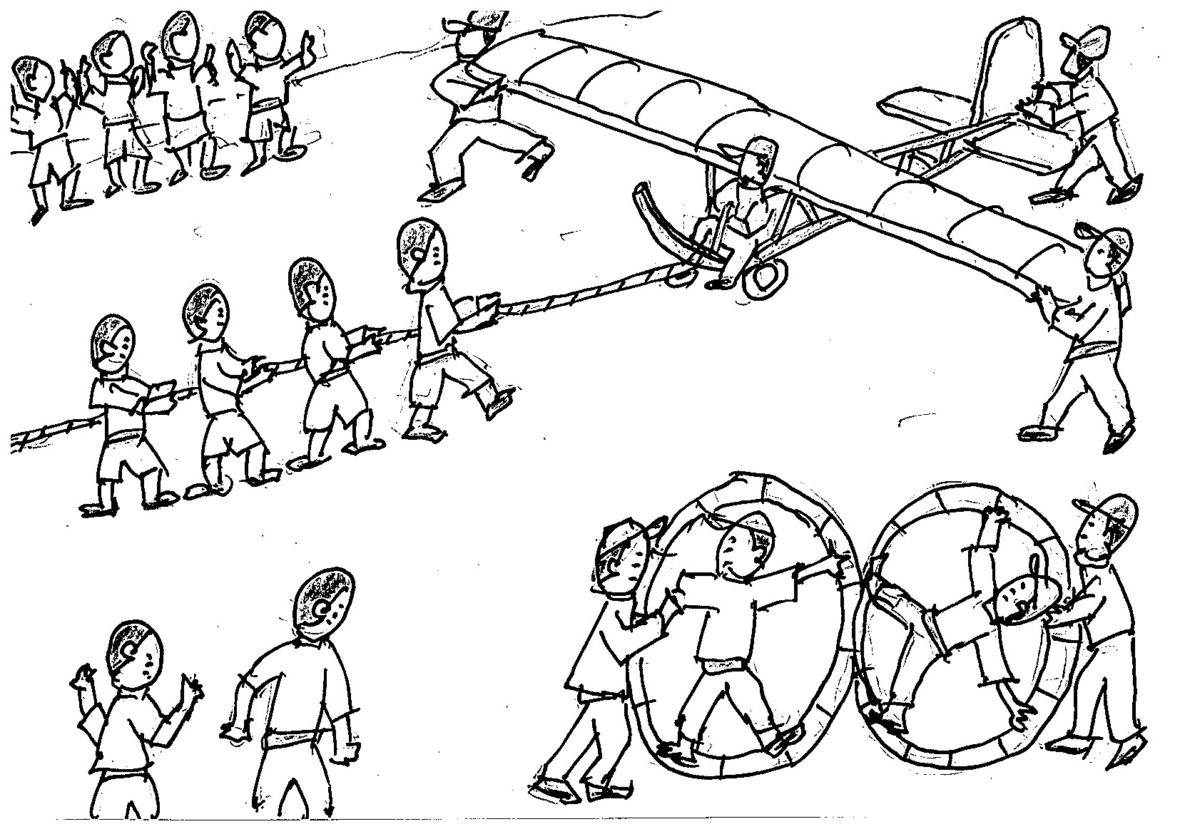 湯江小学校の運動場で動かされるグライダーと回転する大車輪の画像
